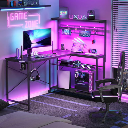 L Shaped Gaming Desk with Power Outlets, 51 Inch Large LED Computer Desk Reversible Corner Desk with 4 Tiers Storage Shelves, Gamer Desk with Headset Hooks and Cup Holder, Carbon Fiber Black